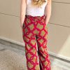Pantalon Wax motifs rouge et camel Niyya