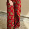Pantalon Wax motifs rouge et camel Niyya
