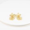 Boucles d'oreilles acier fleurs pendantes